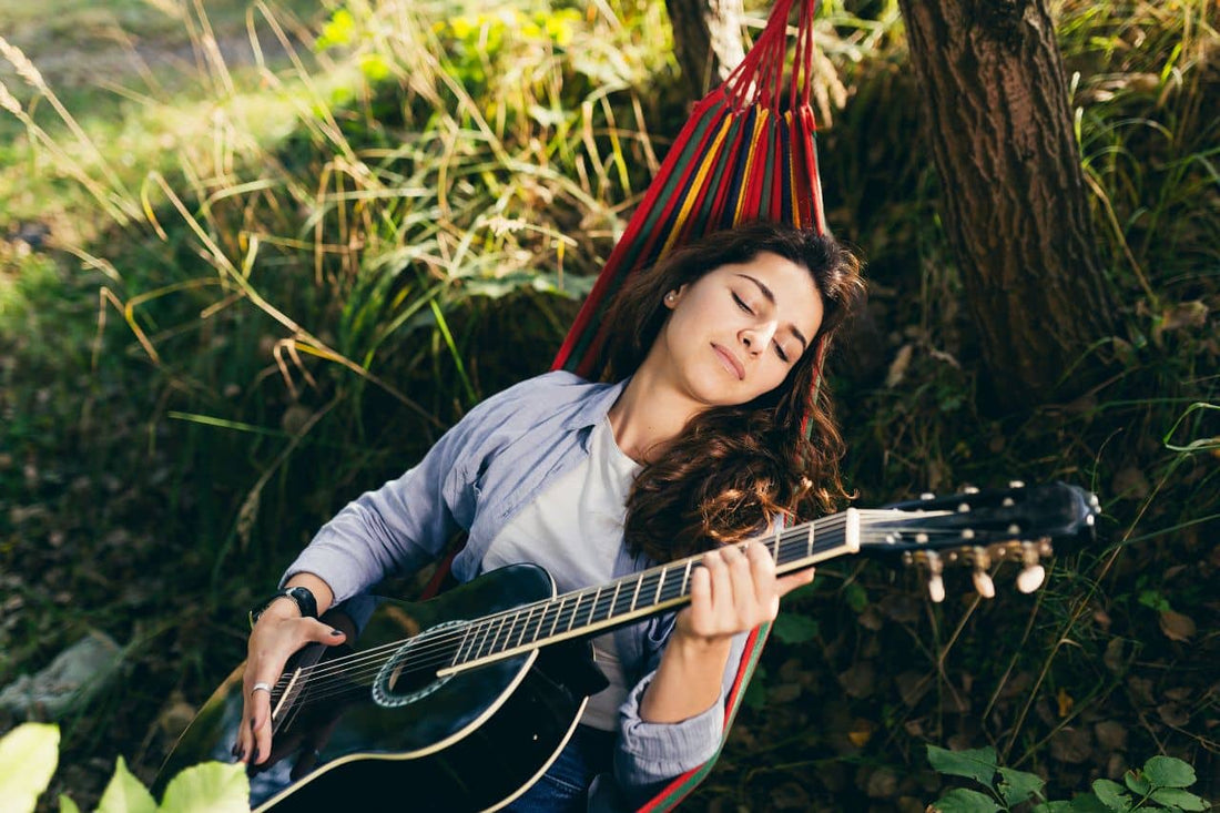 A girl playing guitar